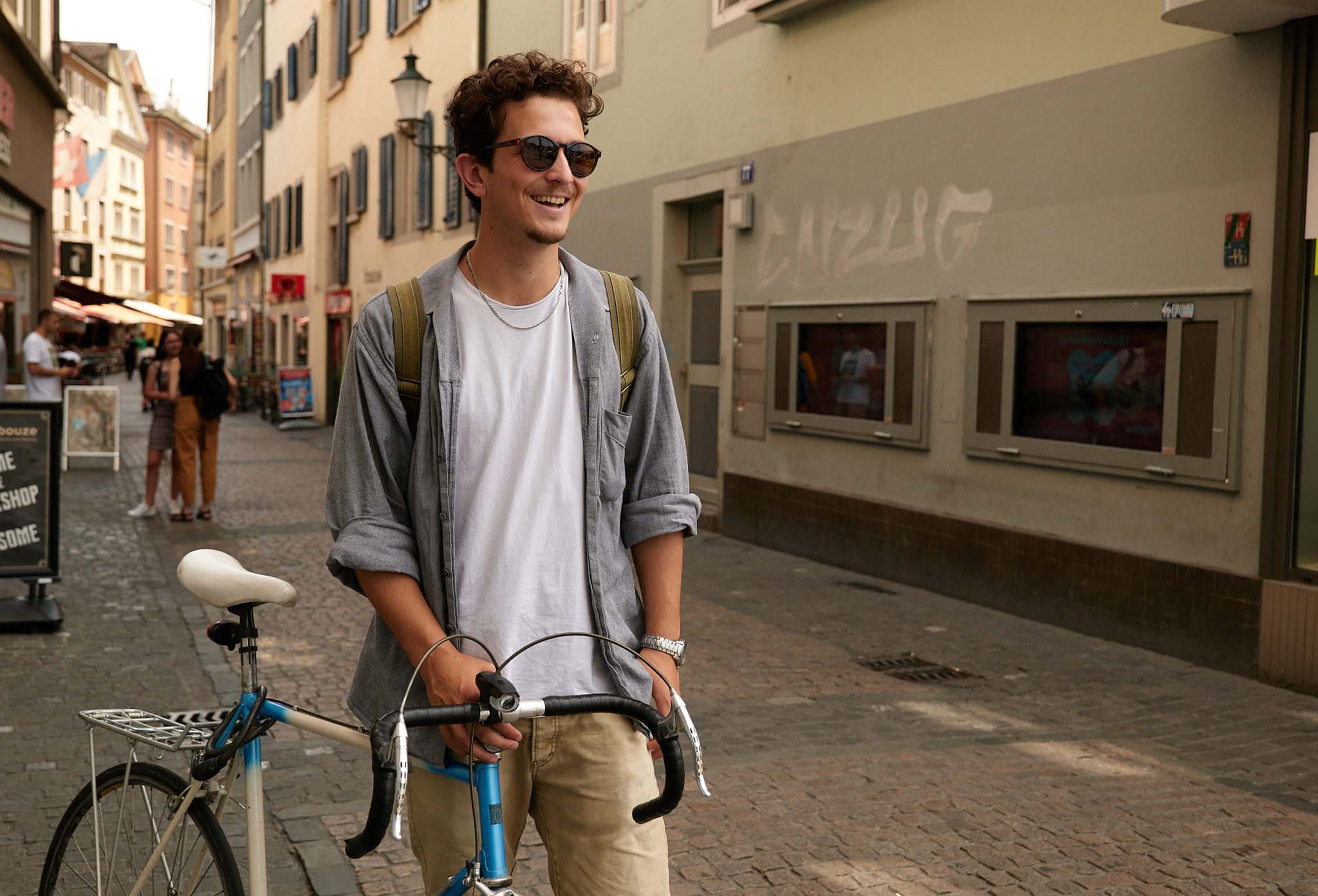 Barista with bicycle in Zurich old town