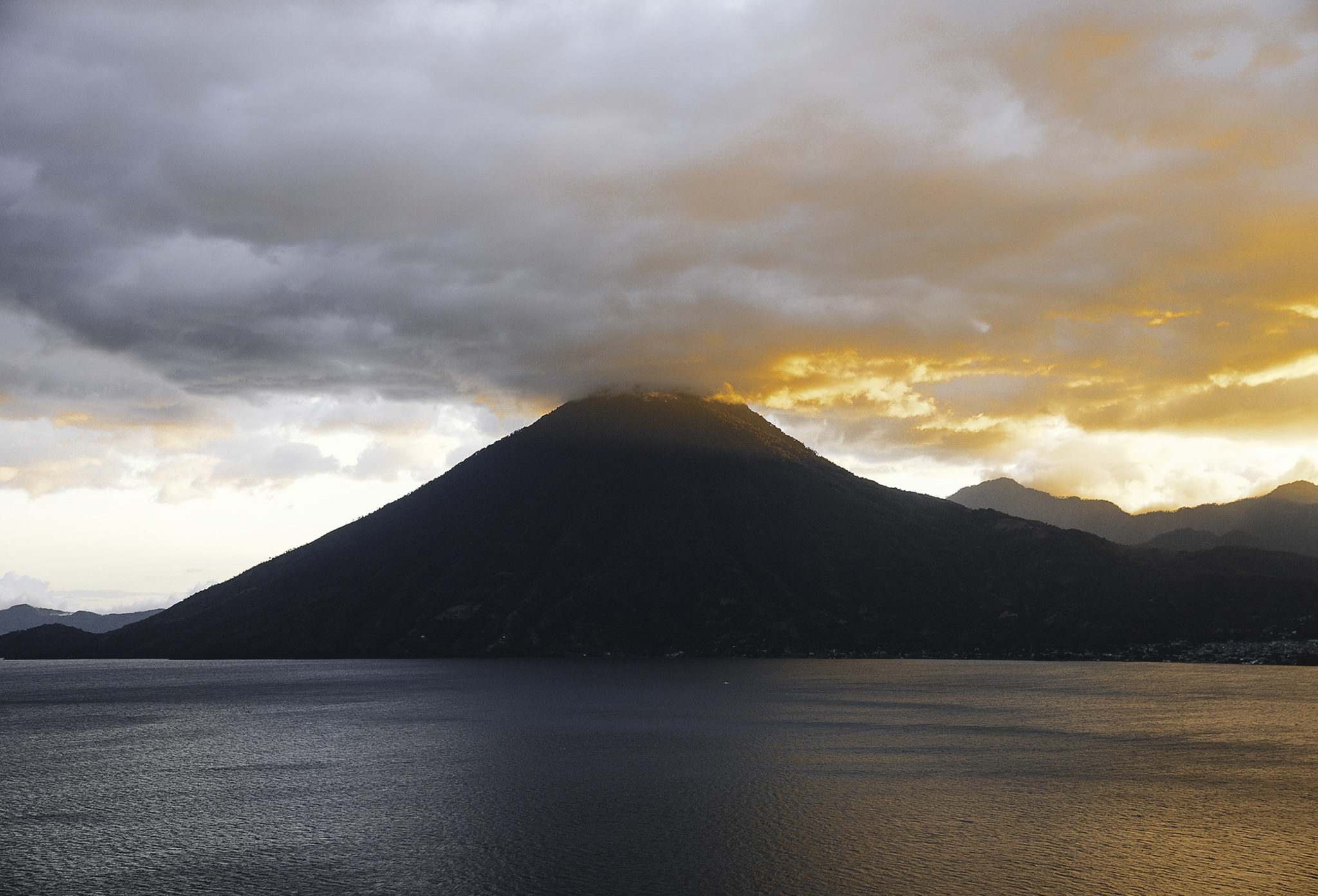 lake of atitlan with volcano in guatemala